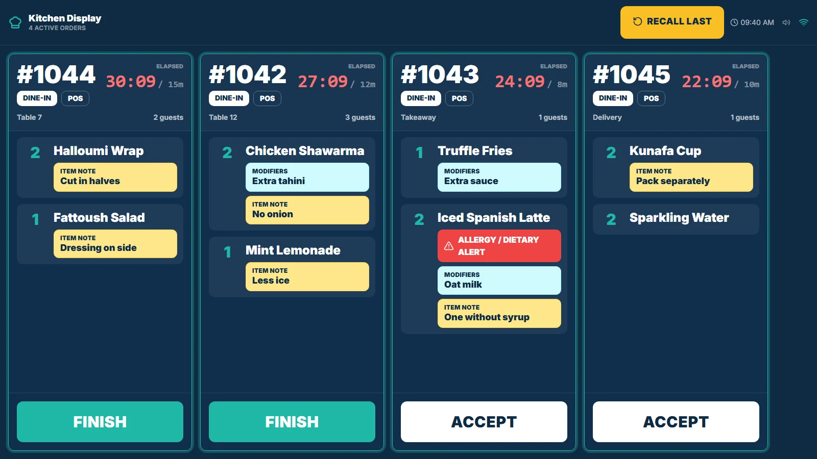 TajerGo kitchen display with four open tickets, item notes, modifiers and an allergy alert, demonstration data